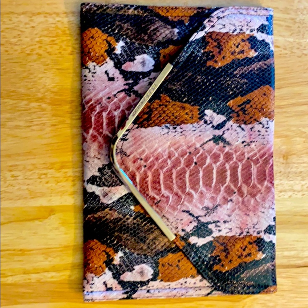 BCBG clutch purple snake print